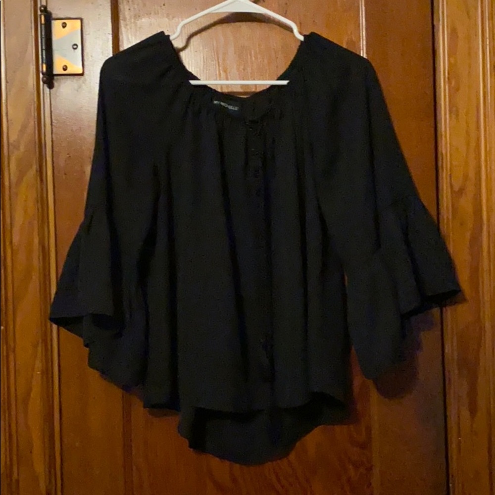 Black sleeve blouse with tassels